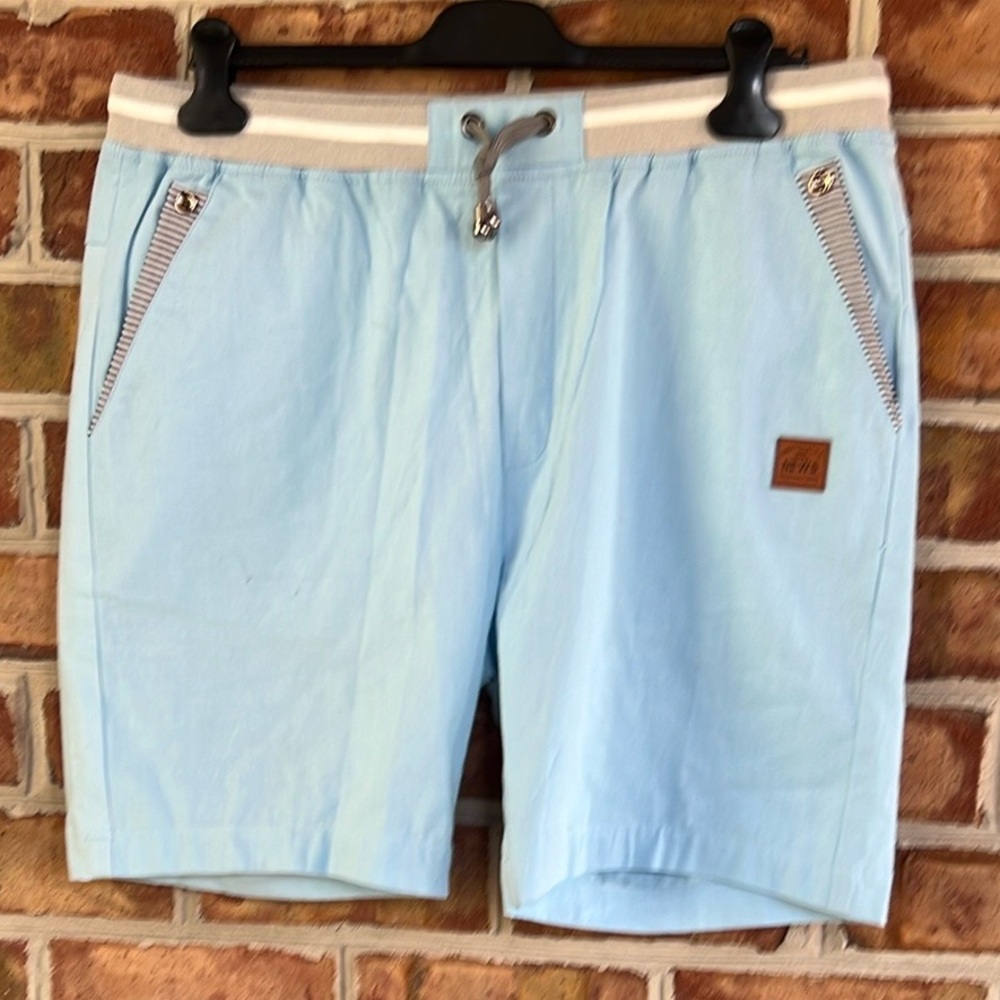 Reverb Light Blue Shorts with Brown Patch. See measurements for size